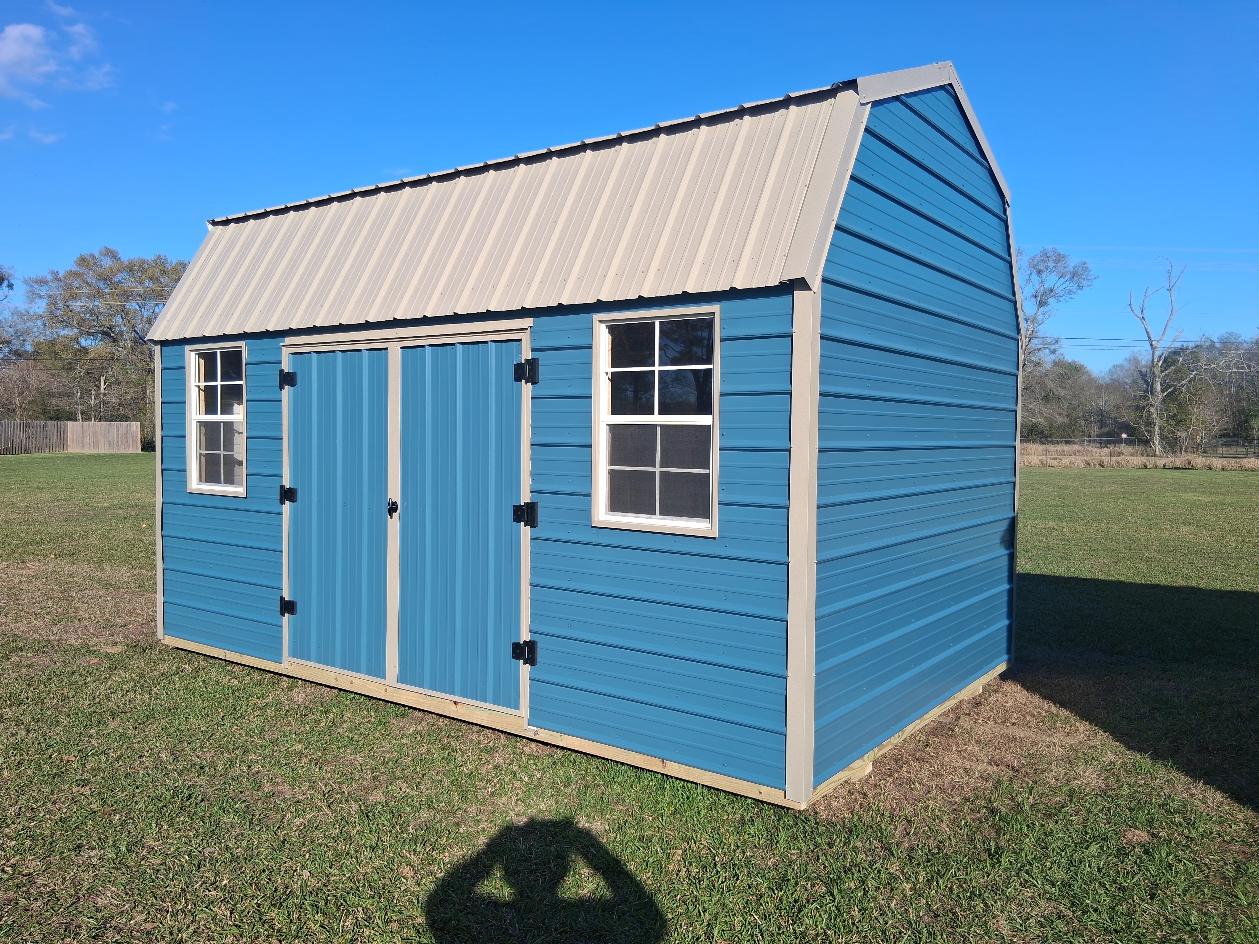 Metal-sided portable building