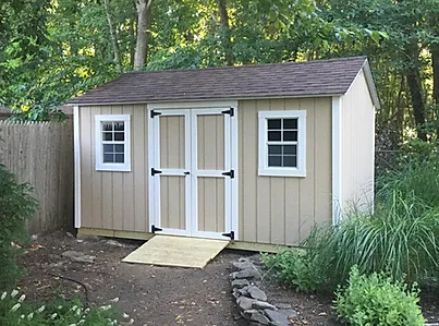 beige shed with a ramp